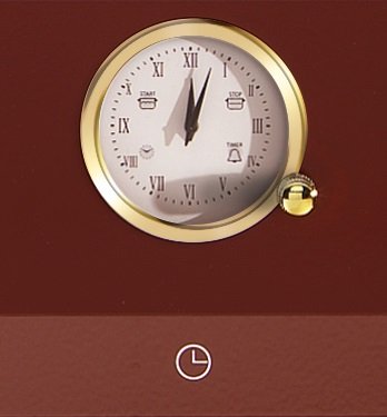 Relógio com 4 Funções: com uma elegante moldura em latão, funciona como relógio, conta-minutos, timer e programação futura que liga e desliga automaticamente o forno durante o tempo desejado.