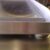 Mesa com 0,6 cm de espessura: em aço inox, proporciona uma distribuição rápida e homogênea de calor por toda a superfície da mesa do grill.
