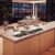 cooktop_tecno_rota_thv100_bancada_gourmet.jpg Aplicação em Bancadas Gourmet: os 5 queimadores em linha ao longo dos 151 cm do THV100 oferecem total interação entre o chef e seus convidados.