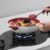 cooktop_tecno_rota_thv100_suporte_panela_wok_.jpg Suporte de Panelas Wok: acessório que permite utilizar panelas Wok com mais praticidade e segurança no queimador Triplo.