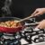 Suporte para Panelas Wok: permite utilizar o queimador triplo no preparo de receitas orientais.